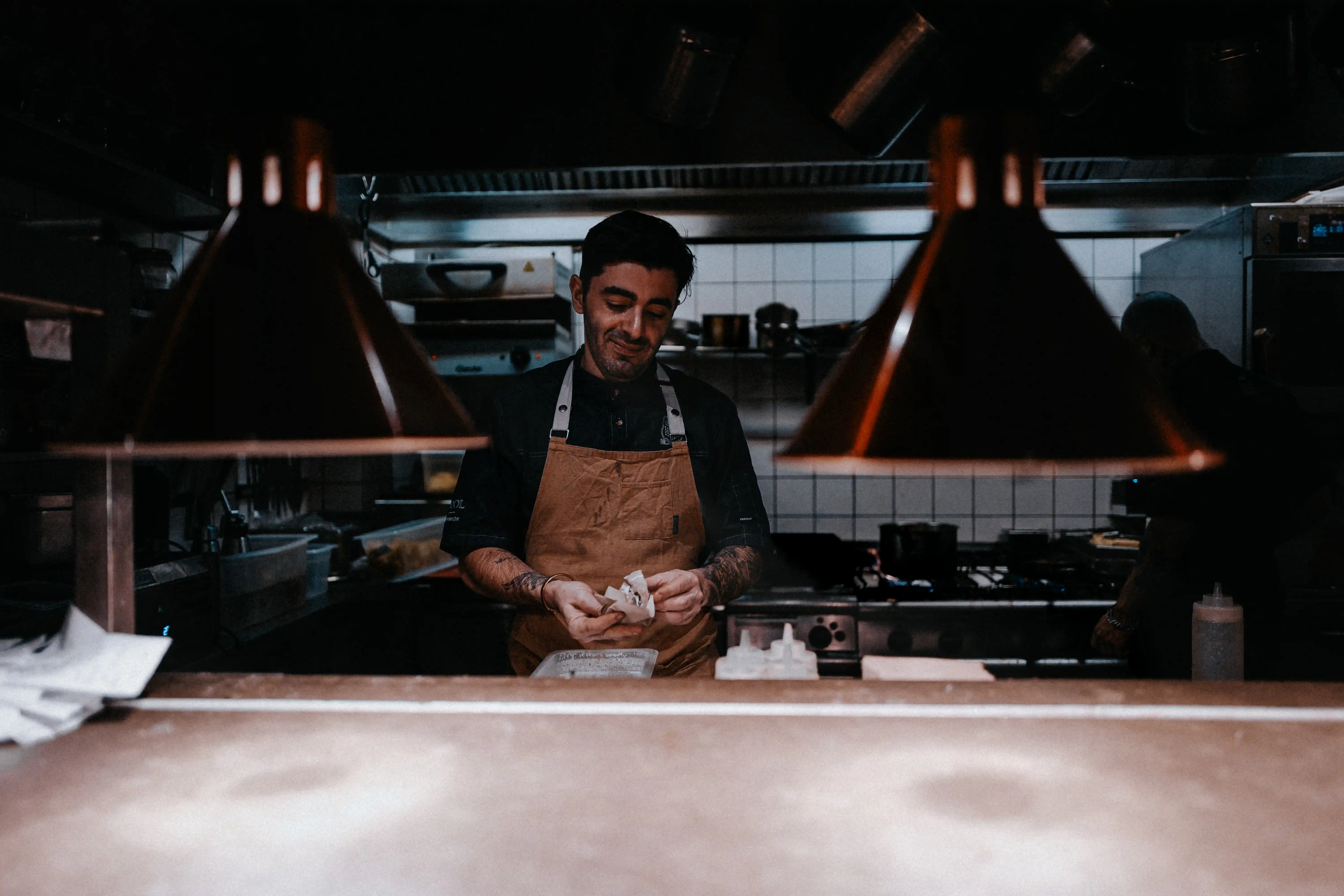 A man preparing food in the kitchen